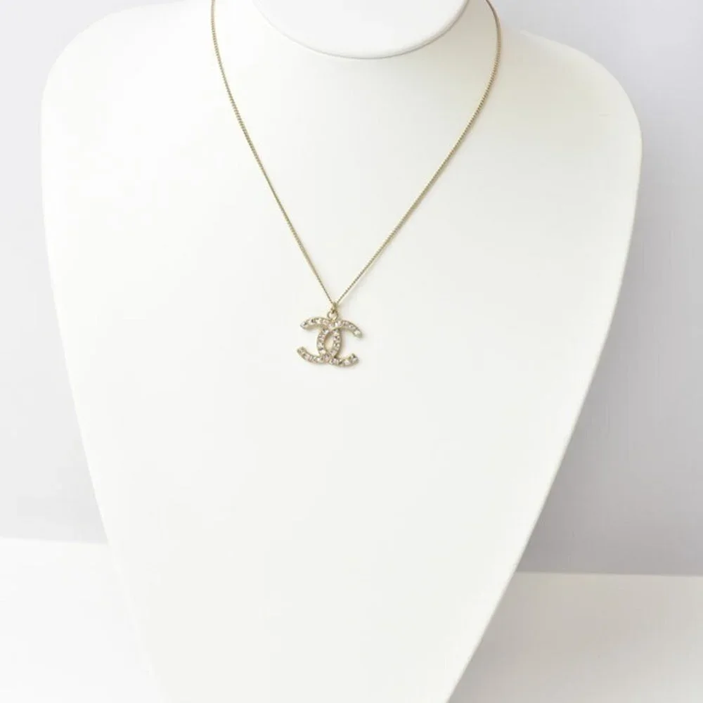 CHANEL Authentic Gold Logo Necklace